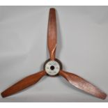 A Vintage Wooden Three Bladed Propeller