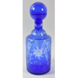 A Modern Overlaid Blue Glass Bohemian Style Decanter, 30.5cm high