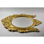 A Mid 20th Century Ornately Framed Gilt Wall Mirror, Overall Measurement 74x47cm