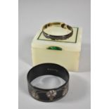 An Onyx Jewellery Box Containing Two Bangles