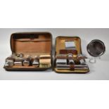 Two Leather Cased Gents Travelling Sets and a Travel Easel Mirror