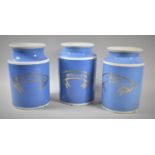 A Set of Three Blue Glazed Tobacconist Shop Tobacco Jars Inscribed for 'Fine Cut Virginia', '