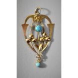 A 9ct Gold and Turquoise Pendant, 4cm Long