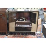 A 1950's Radiogram by Ferguson, 105cm wide