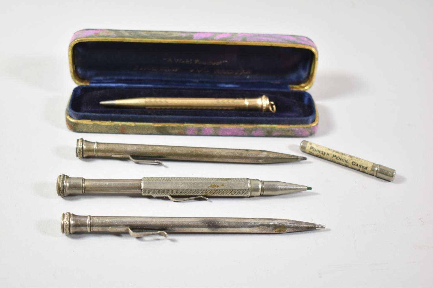 A Gold Plated Wahl Eversharp Propelling Pencil and Three Others Together with Tube of Baxters