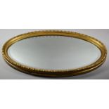 A Gilt Framed Oval Wall Mirror, 74x46cm Overall