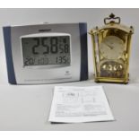 A Schatz Brass Cased Clock with Suspension Movement and a Radio Controlled Calendar Thermometer
