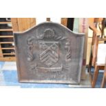 A Cast Iron Fire Back Inscribed 'Perche Canada' and Armorial Crest, 73cm Wide and 73cm high