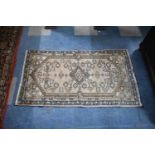 A Small Patterned Woollen Hearth Rug, 117x67cm