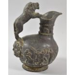 A 19th Century Basalt Effect Plaster Wine Jug, the Body Decorated in Relief with Dancing Figures and