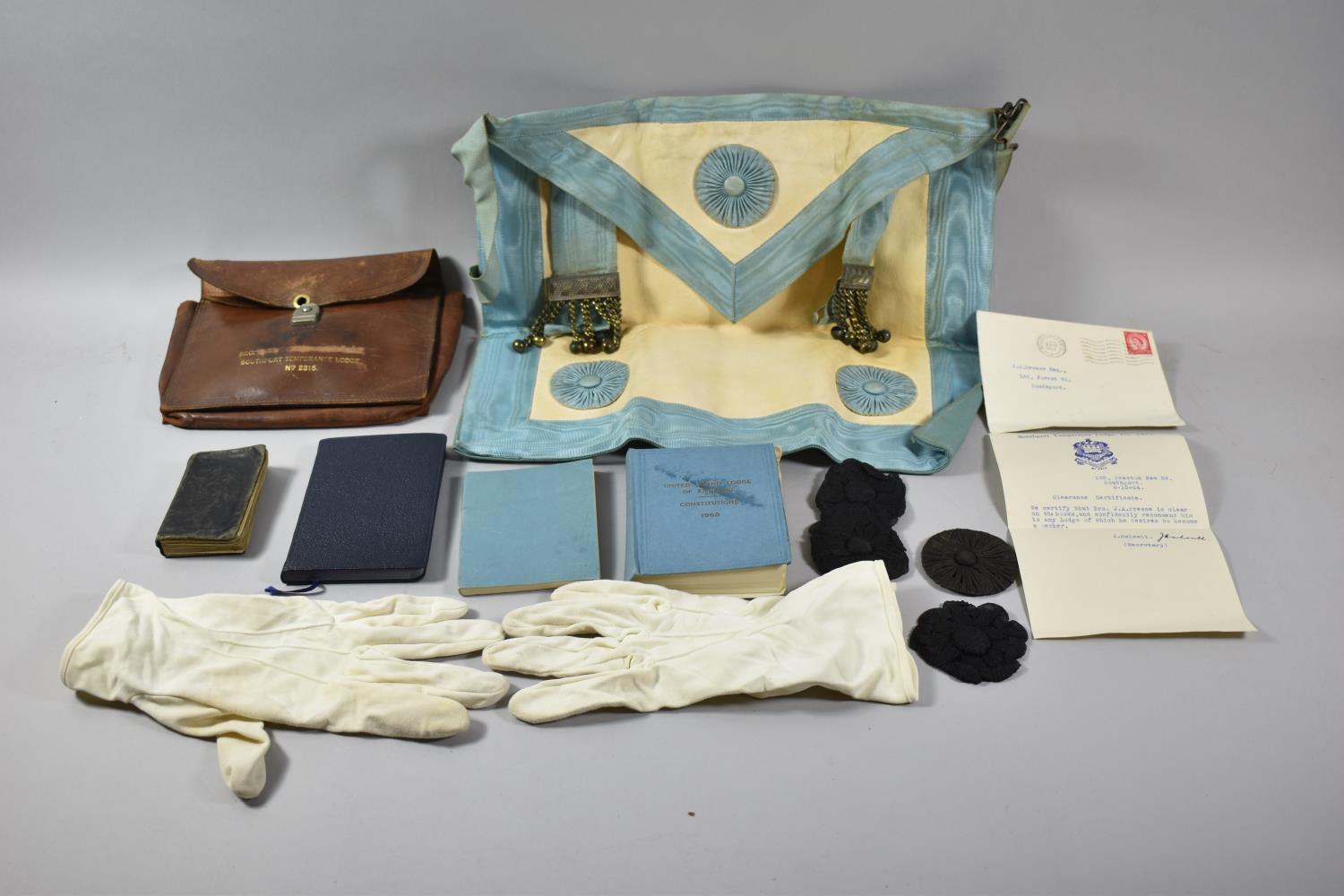 A Collection of Various Masonic Ephemera to Include Apron, Books and Booklets, Bag etc