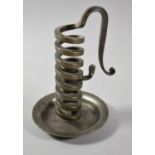 A Modern French Pewter Candlestick in the Form of a Spring with Adjuster Screw, 15.5cm high