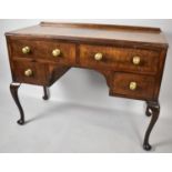 An Edwardian Galleried Writing Desk with Four Drawers and Brass Knobs and Cabriole Supports, 117cm