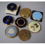 A Collection of Various Stratton Powder Compacts