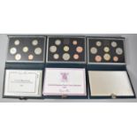 A Collection of Three British Coin Sets for 1984, 1986 and 1988