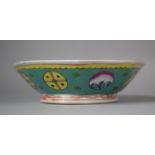 A Early 20th Century Nyonya Straits Porcelain Bowl of Octagonal Form, on Teal Ground Decorated