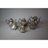 A Collection of Various Pewter Teapots, Five in Total Together with Two Jugs