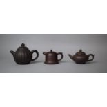 Three Yixing Teapots to Include Ribbed Example, Tallest 10cm high