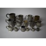 A Collection of Various Pewter Tankards and Measures, Fourteen in Total