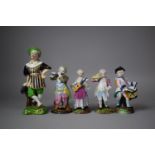 A Collection of Two Pairs of Continental Porcelain Figures or Musicians Together with a Larger