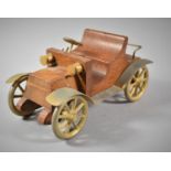 A Brass Mounted Italian Teak Model of a Vintage Car, 17cm long