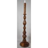 A Mid 20th Century Turned Carved, Turned and Reeded Wooden Standard Lamp