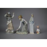 A Collection of Four Spanish Figural Ornaments to Include Two Lladro