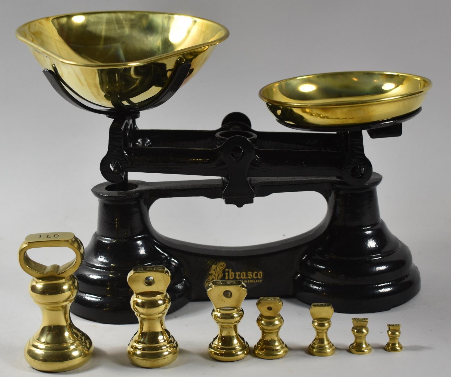 A Set of Black Cast Iron Kitchen Scales by Librasco with Brass Pans and Set of Graduated Bell