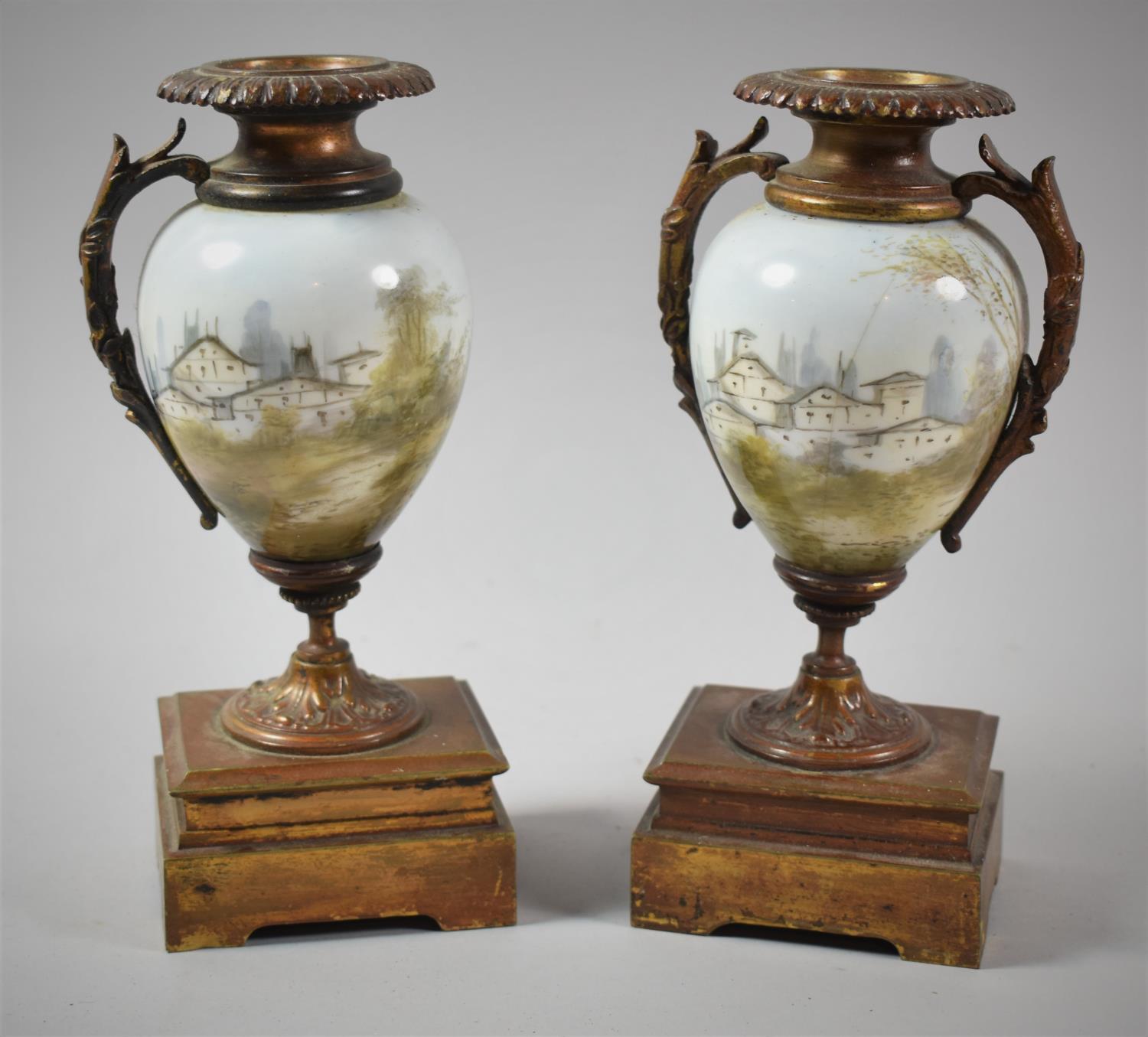 A Pair of French Ceramic and Ormolu Clock Garnitures of Vase Form, One Missing Handle, 20.5cm High