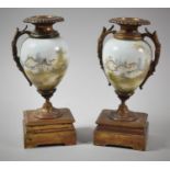 A Pair of French Ceramic and Ormolu Clock Garnitures of Vase Form, One Missing Handle, 20.5cm High