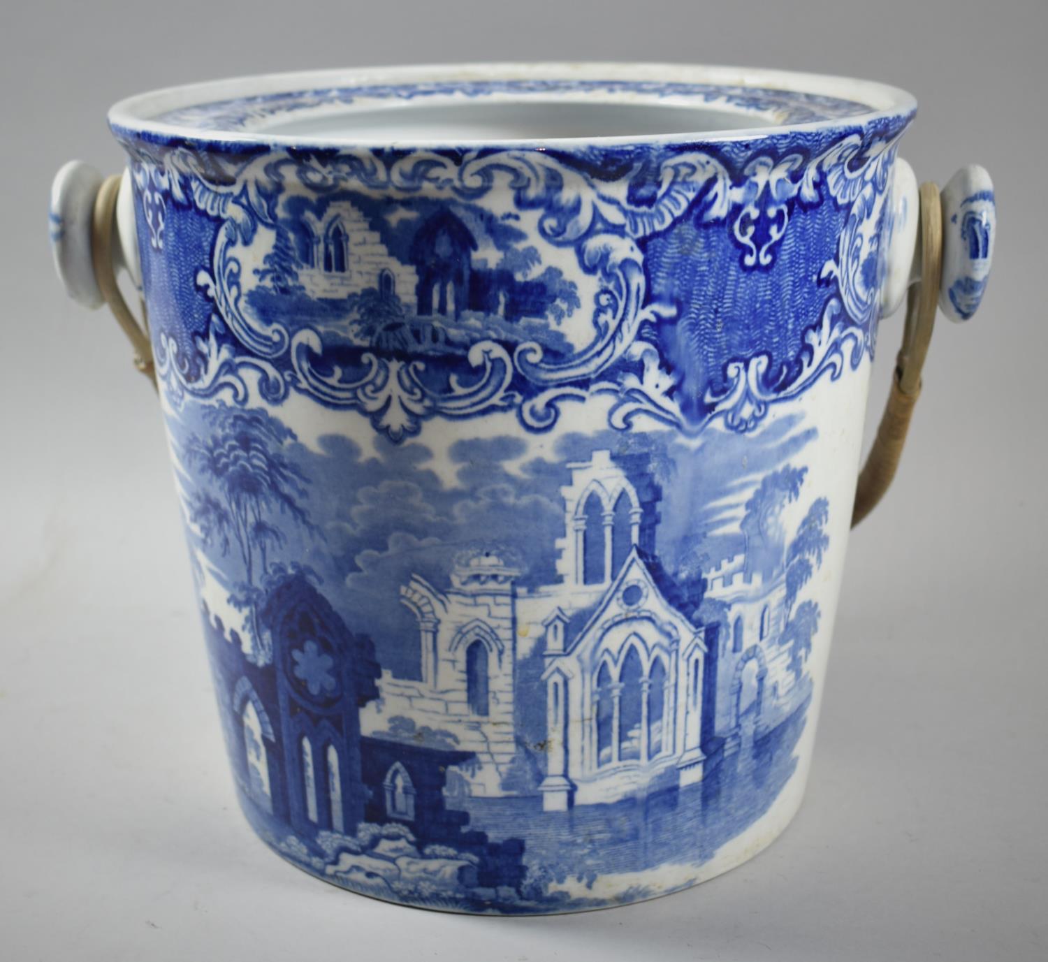 A Transfer Printed Blue and White Toiletry Pail with Cane Loop Handle, 25cm high, Chip to Base - Image 2 of 5