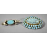 Two Vintage Turquoise Mounted White Metal Brooches
