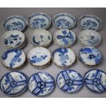 A Collection of 27 Pieces Oriental Blue and White China to Include Shallow and Shaped Bowls,