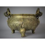 A Large and Heavy Chinese Bronze Cast Censer with Twin Dragon Stylised Handles Set on Tripod