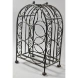 A Modern Wrought Iron Five Bottle Wine Rack with Carrying Handle, 38cm high