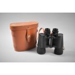 A Pair of Leather Cased Regent 10X50 Binoculars