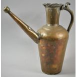 A Copper and Brass Jug, 30cm high