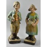 A Pair of Plaster Figural Ornaments of Dutch Boy with Boat and Girl with Flowers, 42cm High