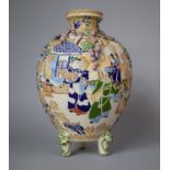 A Large Chinese Satsuma Vase of Globular Form Raised on Tripod Temple Mask Supports, Decorated in