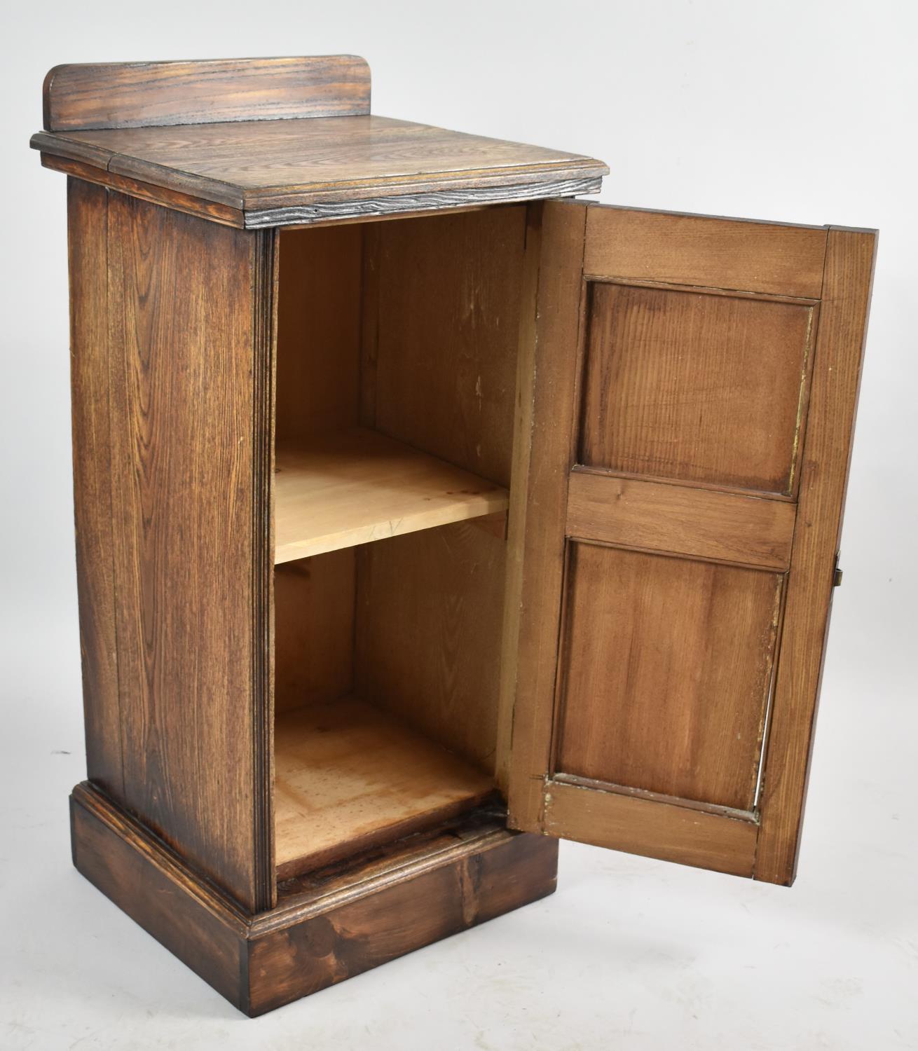 A Mid 20th Century Oak Galleried Bedside Cabinet with Carved and Panelled Door and Brass Handle, - Image 2 of 2