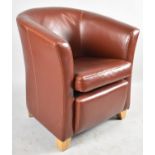 A Modern Leather Effect Tub Armchair