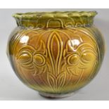 A Green and Brown Glazed Majolica Jardiniere, 25cm high and 30cm Diameter