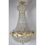 A Reproduction Brass and Perspex Empire Style Ceiling Chandelier, 77cm high