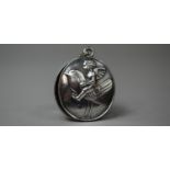 A Silver Plated Locket Pendant Decorated with Fairy Riding a Robin in the Manner of Berthold Loffler