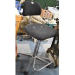 A Modern Swivel Adjustable Work Stool