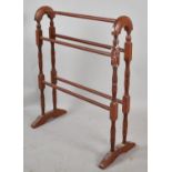 A Reproduction Stained Pine Victorian Style Towel Rail, 61cm Wide