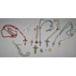 A Collection of Various Religious Rosary Beads, St. Christopher Pendant, Crucifix etc