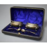 A Cased Pair of Silver Mustards with Cobalt Blue Glass Liners, Chester 1907 by Robert Pringle and