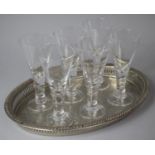 A Silver Plated Oval Galleried Tray Together with Six Dartington Wine Glasses