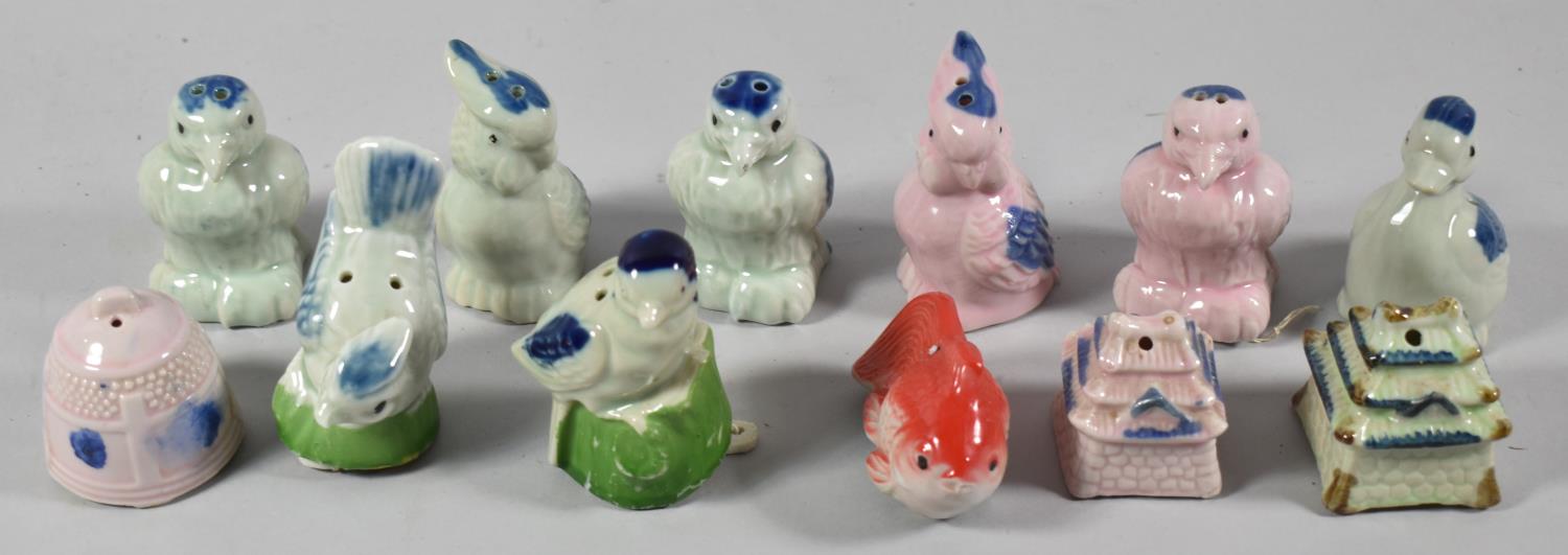 A Collection of Chinese Ceramic Figures of Birds, Goldfish and Pagoda, Complete with Paper Labels